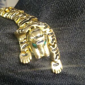 Over the Shoulder Articulated 1980 Gold/Black Panther Brooch with Green Eyes